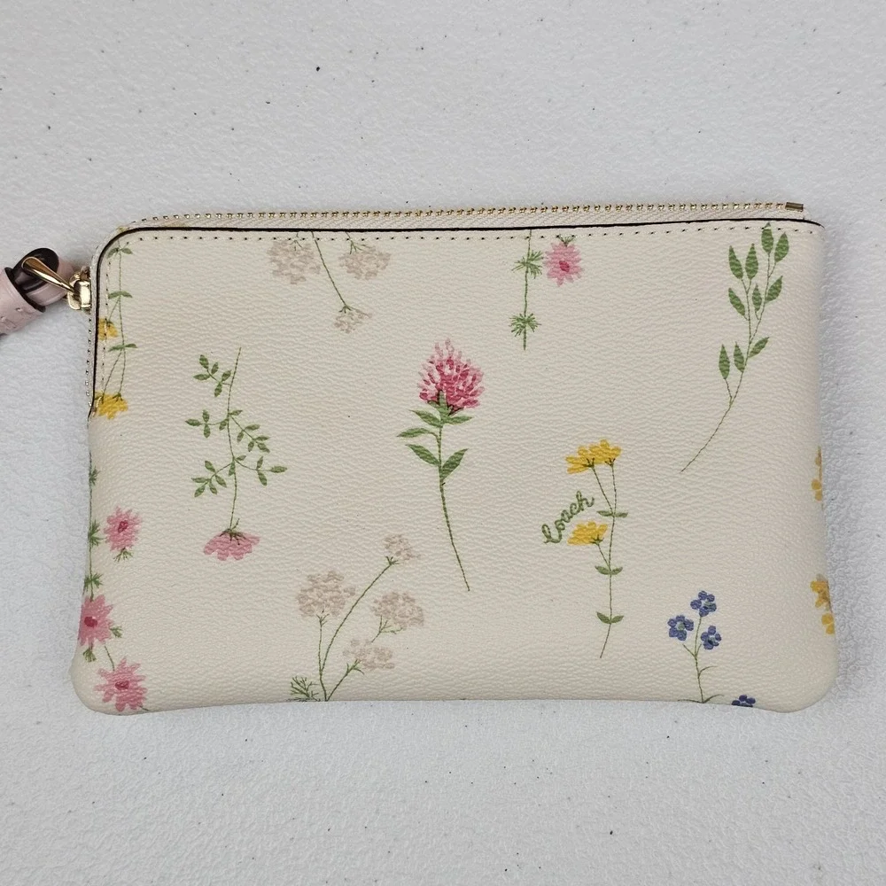 EUC Coach Cream Floral Wristlet